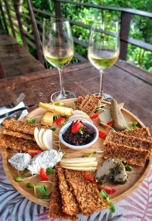 Fantastic cheese board & house wine at Santosa Vegan Restaurant in Phuket