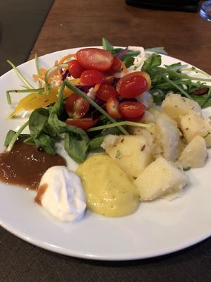 Salad plate including cold potato salad. Mango and  Tamarind dressings, plus mayo. All delicious. at Santosa Vegan Restaurant in Phuket