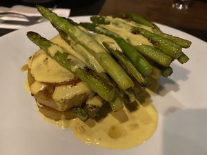 Grilled asparagus with hollandaise sauce at Santosa Vegan Restaurant in Phuket