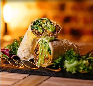 🌱✨ ¡Ven a probar nuestros veggie-wraps en Cantina! Ubicados en Campomanes 5, Madrid, cada bocado está lleno de frescura y sabor. ¡Te esperamos con los brazos abiertos para  at Elena's - Cantina 33 in Madrid