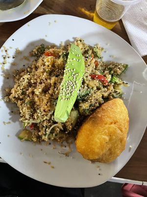 Quinoa chaufa with avo & stuffed  potato (the best part!)  at Vegan Point in Cusco