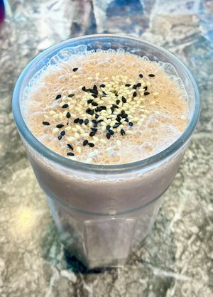 Banana and cocao superfood smoothie  at The Lime Tree Cafe & Kitchen - Al Qudra   in Dubai