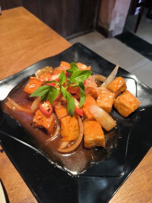 Tofu with tomato and pineapple at Tâm Vegan in Hue