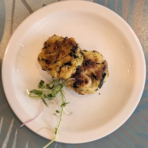 Potato cakes at Planted Community Cafe, Refillery and Hub in Cheltenham