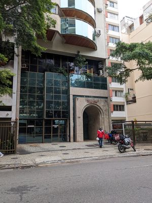 There are no signs outside. This is the front of the building. Ring the bell and take the elevator to level P at Spazziano in Rio De Janeiro