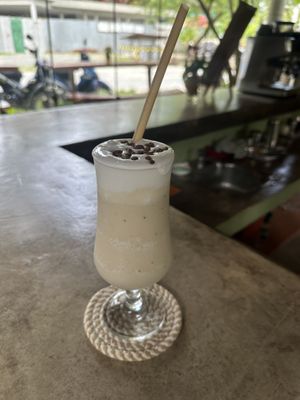 Delicious toffee banana shake on oat milk and dairy free whip  at The Wavy Moon in Siargao
