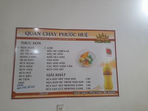 Menu on the wall in Vietnamese only at Cơm Chay Phước Hue in Ho Chi Minh City
