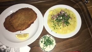 Schnitzel and potato salad at Weingut Feuerwehr Wagner in Vienna