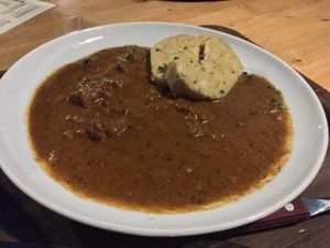 goulash with potato dumplings  at Weingut Feuerwehr Wagner in Vienna