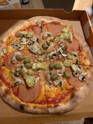 Photo doesn’t make it justice - always delicious pizzas and perfect dough! at Pizza Pinocchio in Vienna