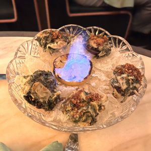 rockefeller (spinach artichoke dip in blue corn shells)  at Vulture in San Diego