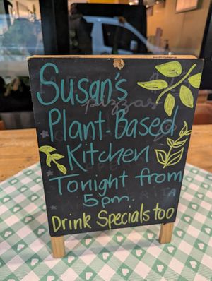 Signage at Susan's Plant Based Kitchen in Mermaid Beach