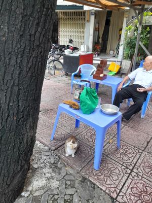 Seating outside on the pavement at Quán chay Hoa Liên in Ho Chi Minh City