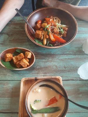 Thom kha, extra fried tempeh and kung pao at Mango in Bangkok