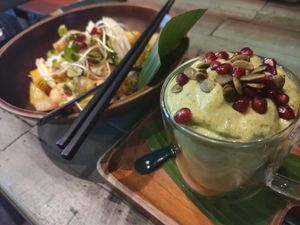 Green Fiber smoothie topped with pumpkin seeds and acai. at Mango in Bangkok