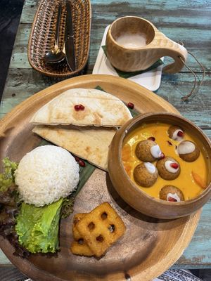 Falafel curry with a latte  at Mango in Bangkok