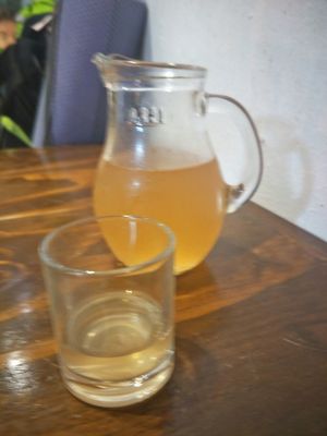 Take some ginger Kombucha shot! at Mango in Bangkok