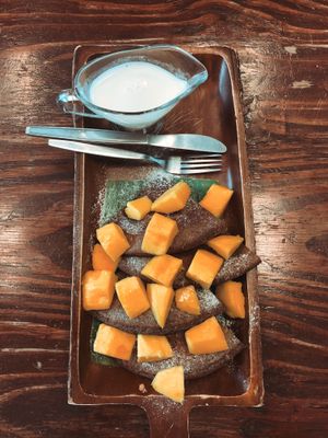 Vegan pancakes with fresh mango   at Mango in Bangkok