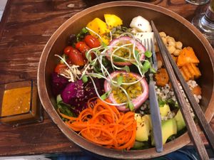 Delicious Buddha bowl with passion fruit in the middle at Mango in Bangkok