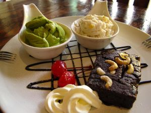 vegan brownie with green tea and coconut ice cream. at Mango in Bangkok