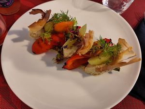 Main dish - Zucchini at the bottom laden with red pepper, potatoes, humous, dill and roasted flaky pastry at So Dream in La Rochelle