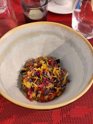 Amuse Bouche - nuts, fruits and vinegar garnished with flowers at So Dream in La Rochelle