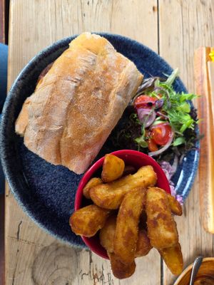 Vegan burger (in a ciabatta roll, not brioche) with chips at Periwinkle Bistro in Wales