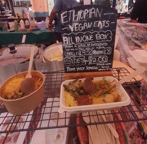 £8 regular, £9.50 large box. 3 samosas £2. at Ethiopian Vegan Eats in East London
