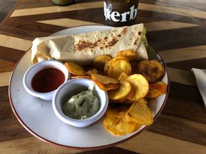Wrap de falafel con chips de papa criolla at Herbívoro -  Av. Suba in Bogota