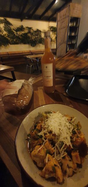Bread, salad, and kombucha at Herbívoro -  Av. Suba in Bogota