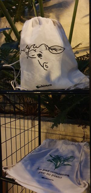 Cute bags "peace begins on your plate" at Herbívoro -  Av. Suba in Bogota