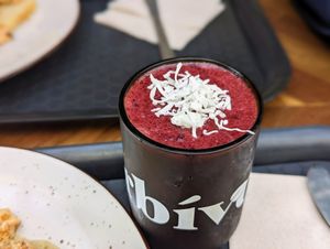 Red berry "milkshake". More or less just a smoothie at Herbívoro -  Av. Suba in Bogota