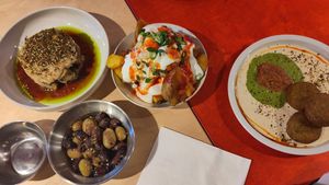 Left to right; Jerusalem artichokes, olives, potatoes and falafels. Two of us were very full after this but they let us take leftovers away in our own tupaware box. at Dust Kitchen in Gdansk