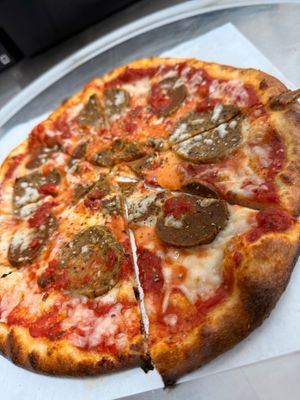 Vegan Meats - 
Vegan cheese with in house made vegan sausage and pepperoni  (All vegan products are soy free) at On The Run Pizza - Ghost Kitchen in Las Vegas