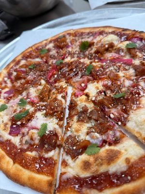 Vegan BBQ Chicken - 
Vegan cheese, pickled onions, jackfruit chicken, glaze with bbq sauce, topped off with cilantro (All vegan products are soy free) at On The Run Pizza - Ghost Kitchen in Las Vegas