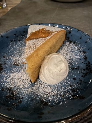 Traditional mallorcan almond cake with caramel sauce and amaretto whipped cream   at Villa Vegana in Mallorca