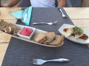 Beetroot aioli with farmers bread, pieroggi stuffed with sauerkraut  at Villa Vegana in Mallorca