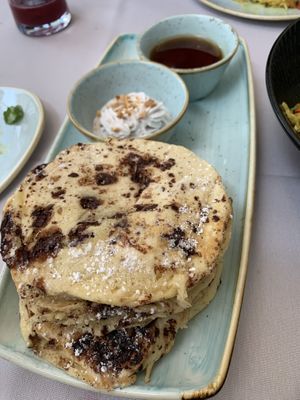Chocolate chip pancakes with coconut whipped cream and oozy syrup at Equinox Restaurant in Washington