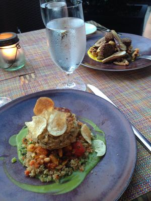 Vegan hearts of palm ";crab cake"; in foreground, eggplant falafel in background at Equinox Restaurant in Washington