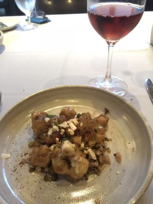 Our favorite. TempuraCauliflower with maple, soy, and a whole lot of excellent  at Equinox Restaurant in Washington