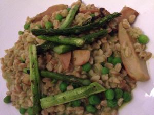 Farro risotto with English peas, asparagus and trumpet mushrooms at Equinox Restaurant in Washington
