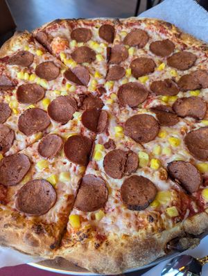 Vegan pepperoni & pineapple pizza at Spice Hub & Fox Point Pizzeria in Lakewood