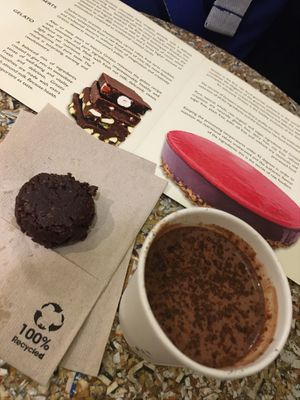 Hot chocolate with raw cocoa cookie at Grezzo Raw Chocolate in Rome