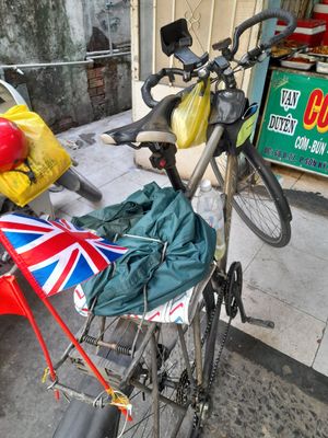 My bicycle outside the restaurant. Parking out front at Com chay Vạn Duyen in Ho Chi Minh City