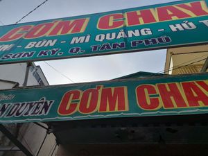Outside sign at Com chay Vạn Duyen in Ho Chi Minh City