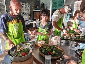 Prepping to make Green curry.
 In the new VIP Cooking School location at Time for Lime in Koh Lanta