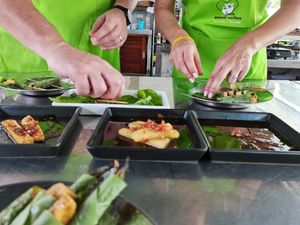 Prepping Tofu / Jicama / Shrimp wrapped in Wild Pepper leaves.  In the new VIP Cooking School location at Time for Lime in Koh Lanta