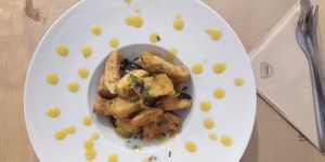 Espectacular berenjena (como mantequilla) rebozada, con una deliciosa salsa de maracuyá at Racimo16 in Gran Canaria