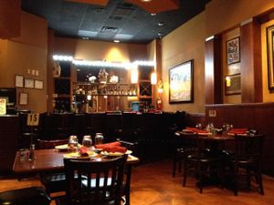 Dining + bar area at Karaikudi Palace in Scottsdale