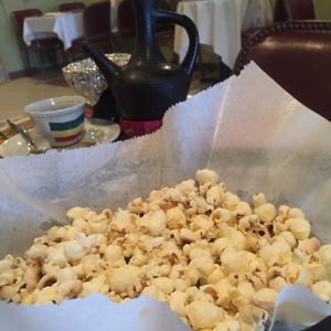 the coffee is served with popcorn  at Abyssinia in Louisville
